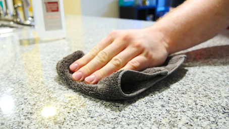 If you want to clean greasy or oily stains from granite countertops, there are a few simple methods to follow. First, you should rinse the area with water. Then, you can use a mixture of baking soda and water to clean stubborn stains. Do not use steel wool on granite as it can damage the material. Alternatively, you can apply a paste made from baking soda and water to the affected area and leave it overnight. After a day, you can wipe the surface with distilled water and polish it with a broom.