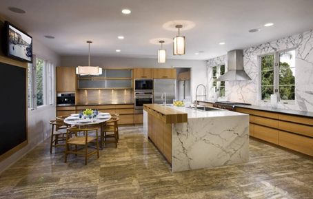 Airy kitchen with an island and dining table