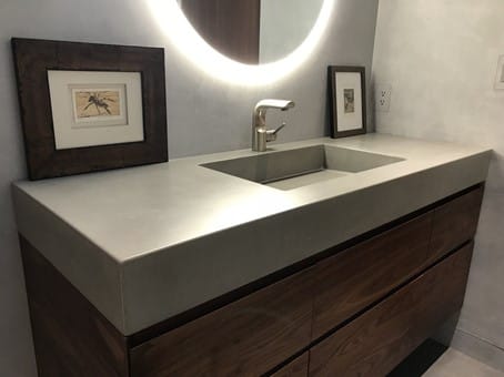 concrete bathroom countertop with a single sink