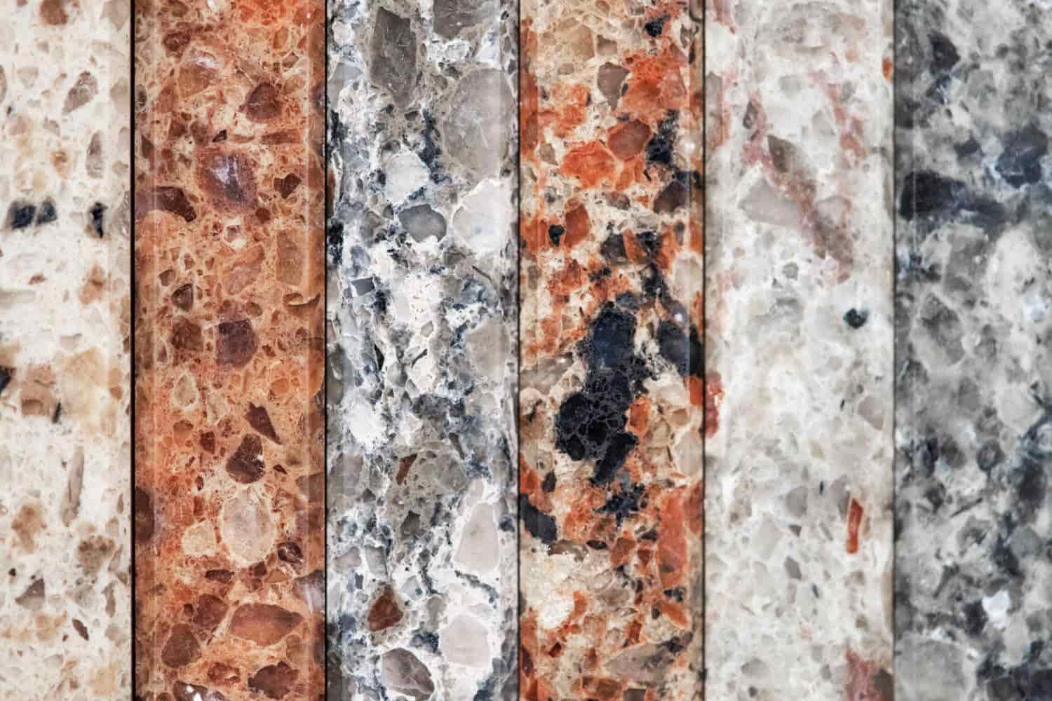 A macro shot of various granite samples